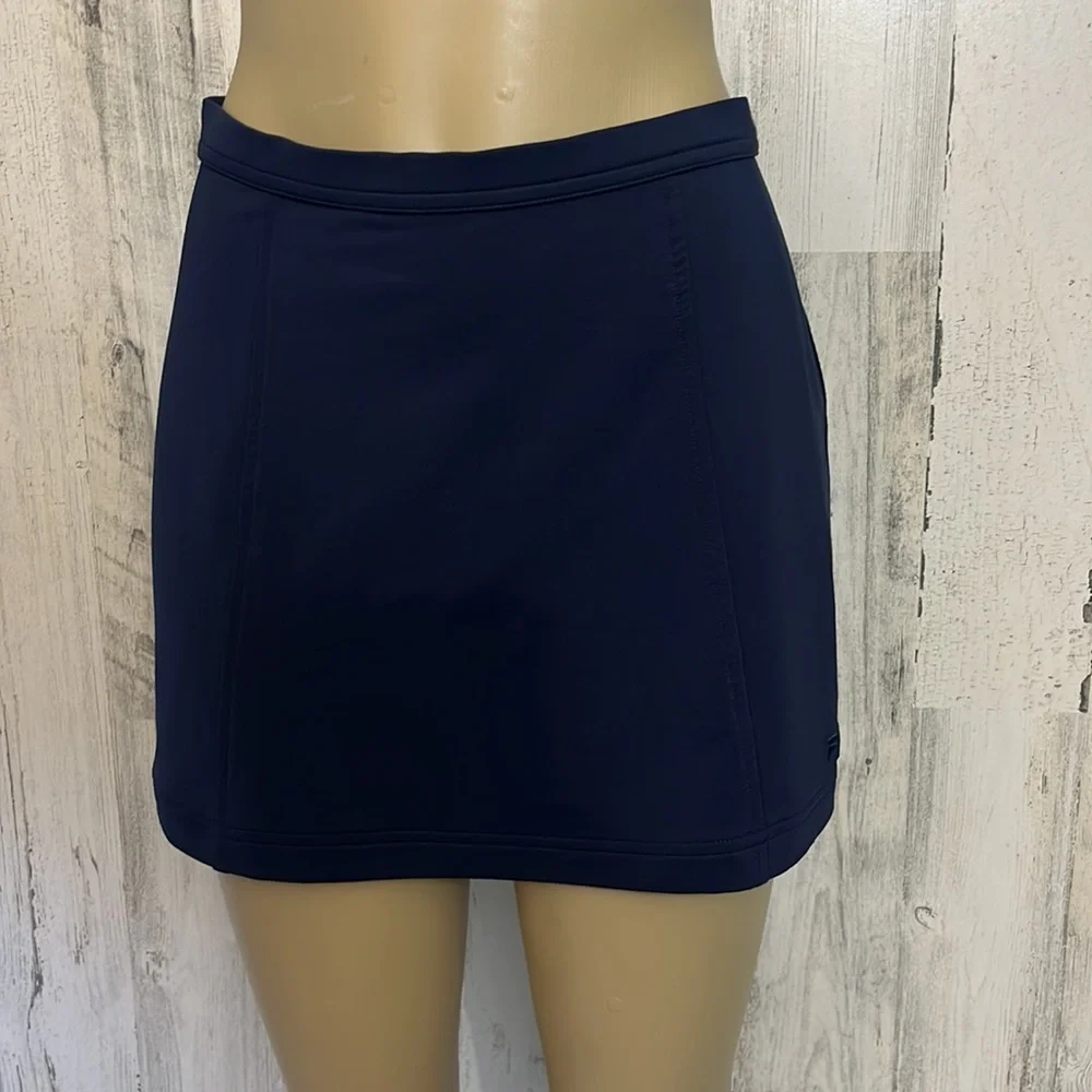A8- small womens blue athletic skirt size S FILA